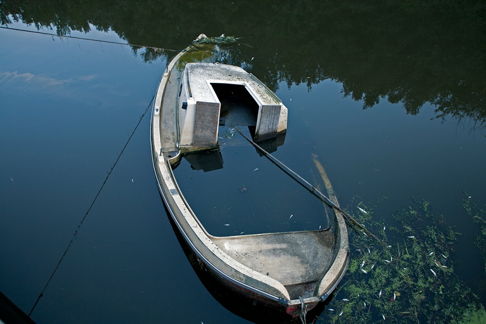 Park Life - The heavy fall rains have sunken a small fishing boat by...