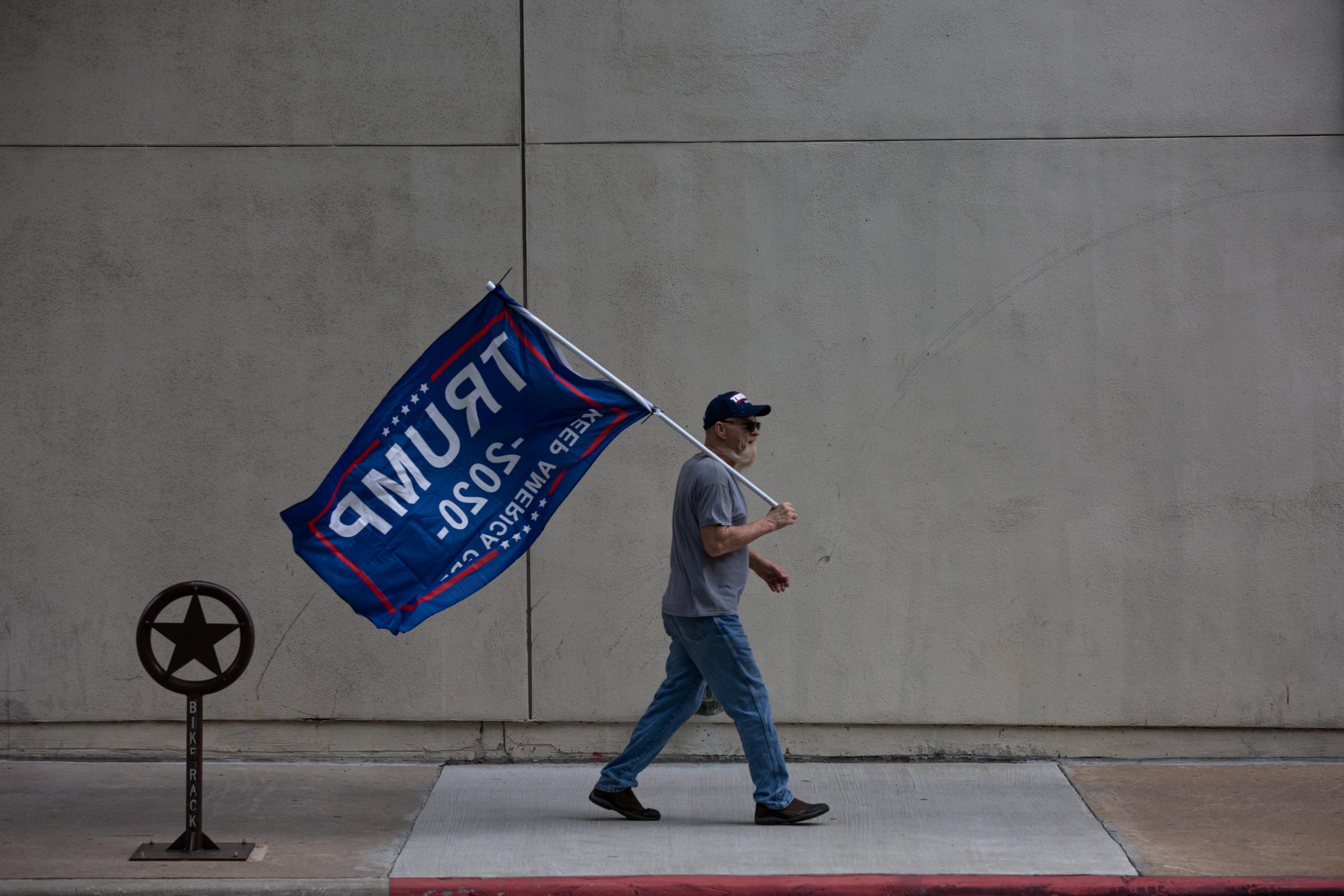 NEWS - 11/14/20 Fort Worth, Texas - A Trump Supporter holds his...