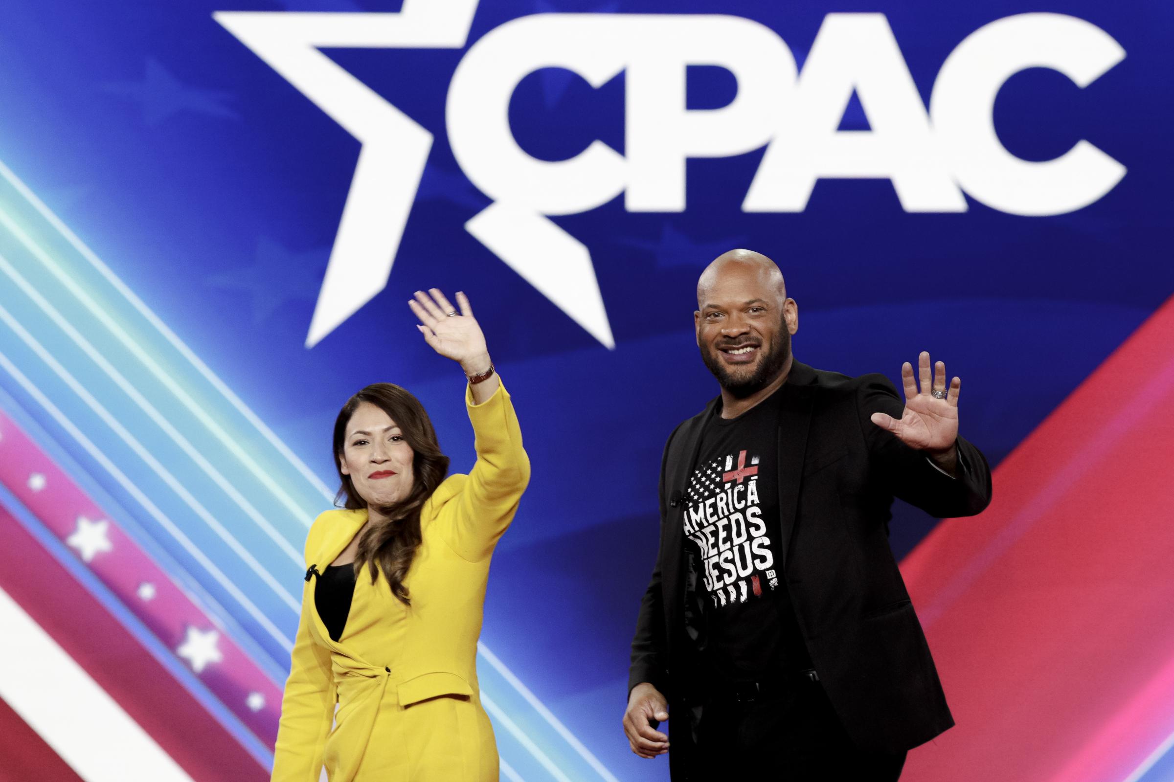 CPAC Texas - Cassy Garcia and David Harris wave goodbye to a cheering...