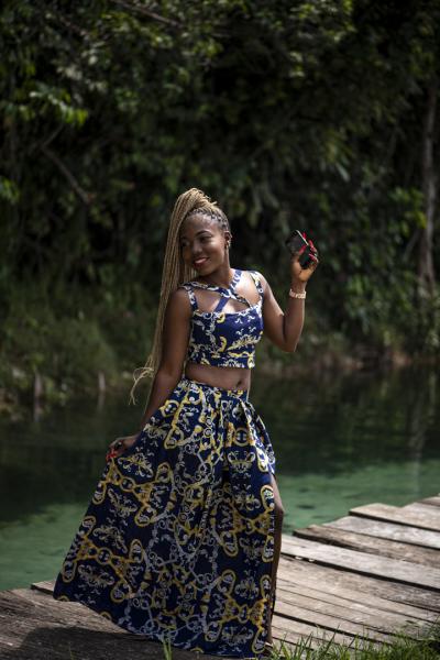 Unusual Niger Delta - A young woman poses for a portrait at a private resort in...