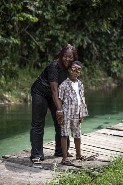 Image from Unusual Niger Delta - A mother and child  pose for a portrait at a private...