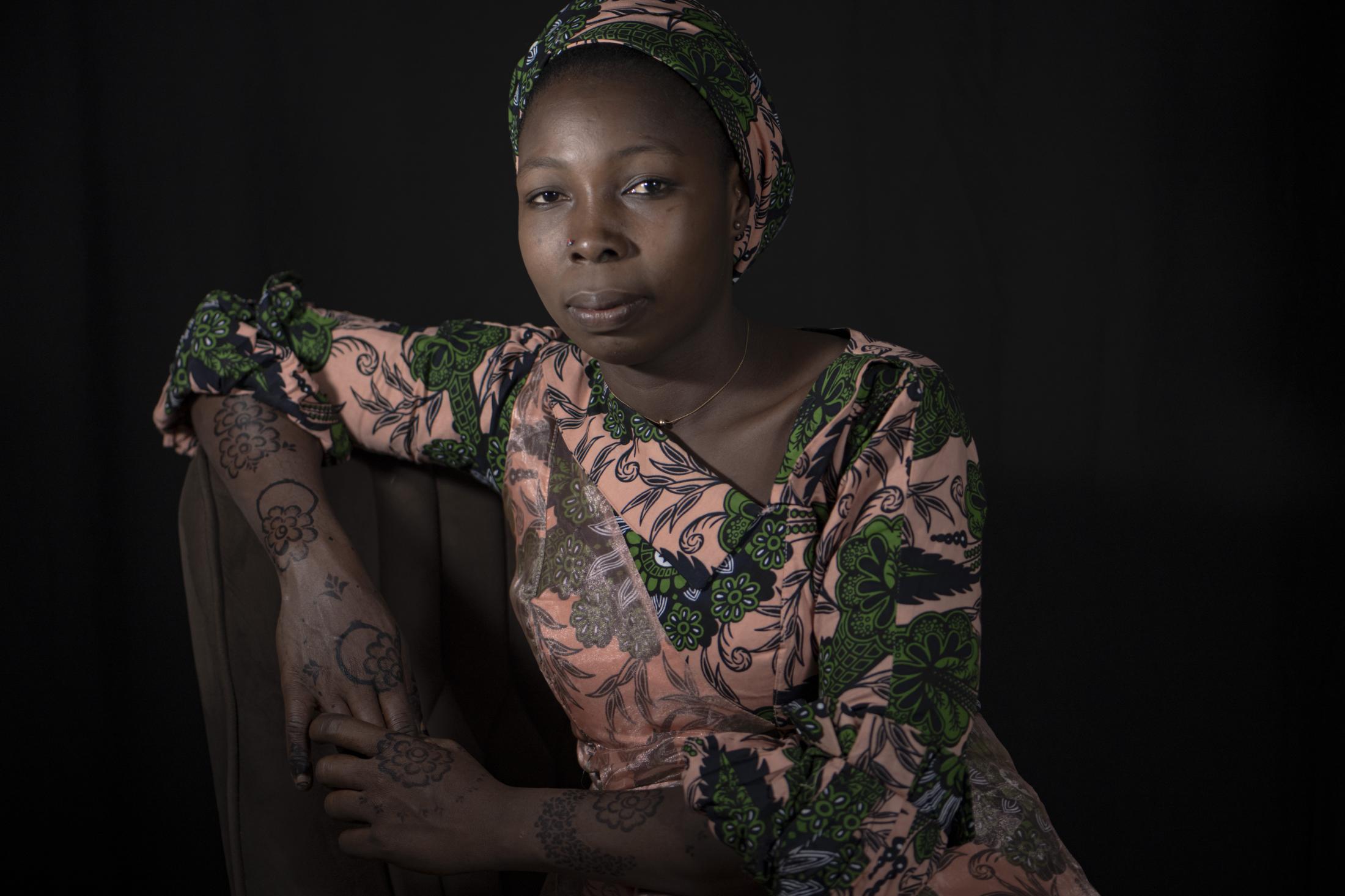 Halima Ali Maiyanga, 26, sits f...rom the forest in 2021. Nigeria