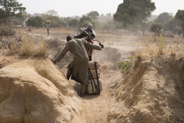 Mubarak&rsquo;s motorbike tumbles while &nbsp;conveying water in jerry cans to his house in Jugurma community, Kwaja village, Adamawa.