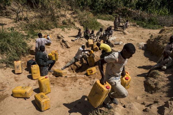 The Water Collectors - Locals in Kissa community in Adamawa fetch water from a...