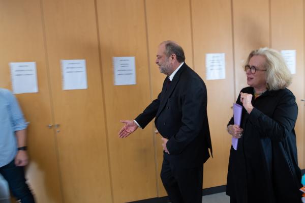France, Grasse, 2023-01-13: Eric Dupond-Moretti and Emmanuelle Perreux greet administrative staff in an office at the Grasse courthouse. The French Minister of Justice Eric Dupond-Moretti is visiting the courthouse in Grasse (Alpes-Maritimes). He promotes a civil justice of conciliation which has allowed the court of Grasse to reduce the backlog of cases by 25%. Photograph by Laurent Coust / Collectif DR. Photograph by Laurent Coust / Collectif DR. Eric Dupond-Moretti et Emmanuelle Perreux saluent des employ&eacute;s administratifs dans un bureau du palais de justice de Grasse. Le Garde des Sceaux fran&ccedil;ais Eric Dupond-Moretti est en visite au palais de justice de Grasse (Alpes-Maritimes). Il promeut une justice civile de conciliation qui a permis au tribunal de Grasse de diminuer de 25% les dossiers en souffrance. Photographie par Laurent Coust / Collectif DR GRASSE France