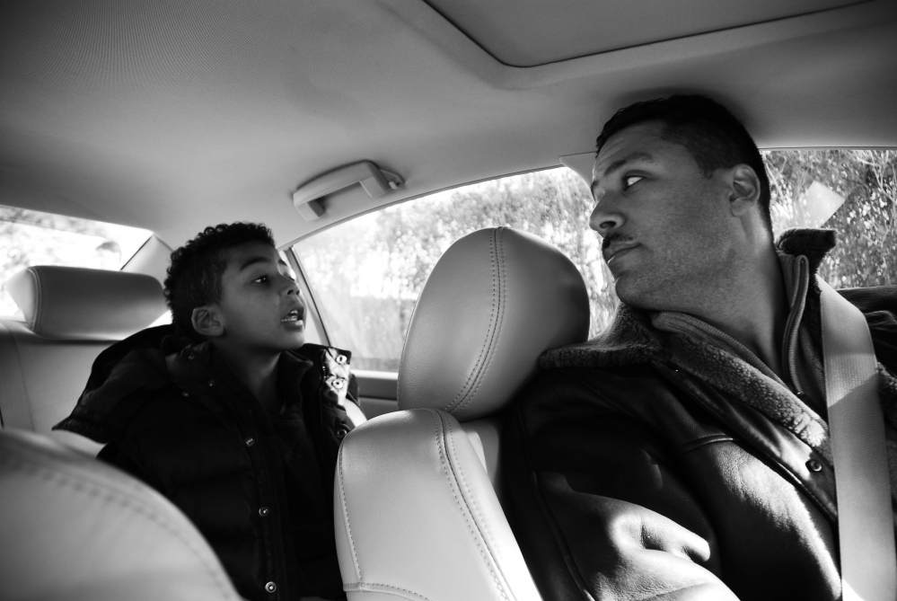 Exoneration: Life After Innocence -  Fernando and his son catch up on the day. 