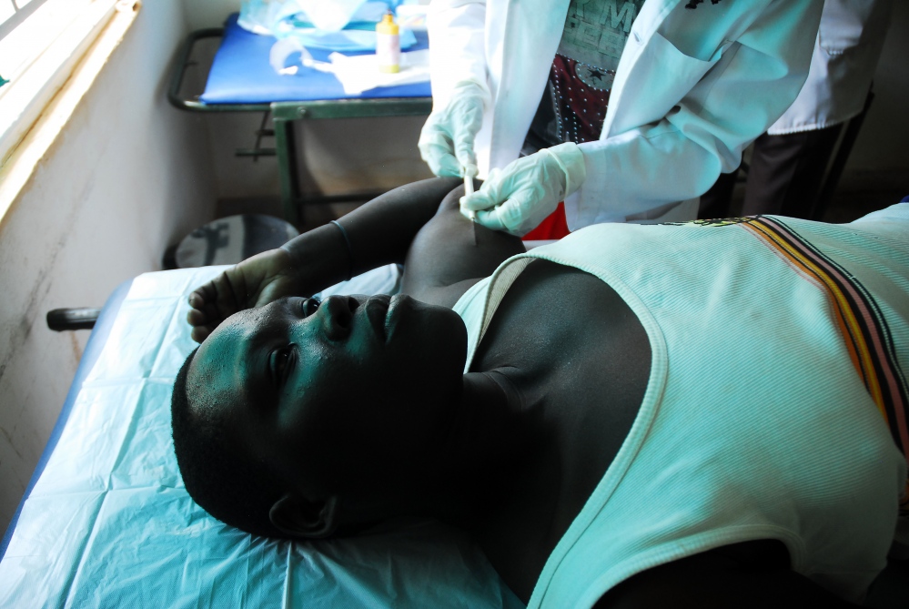  A woman receives ART treatment at the Lumino Health Center III in the Busia district of Uganda. 