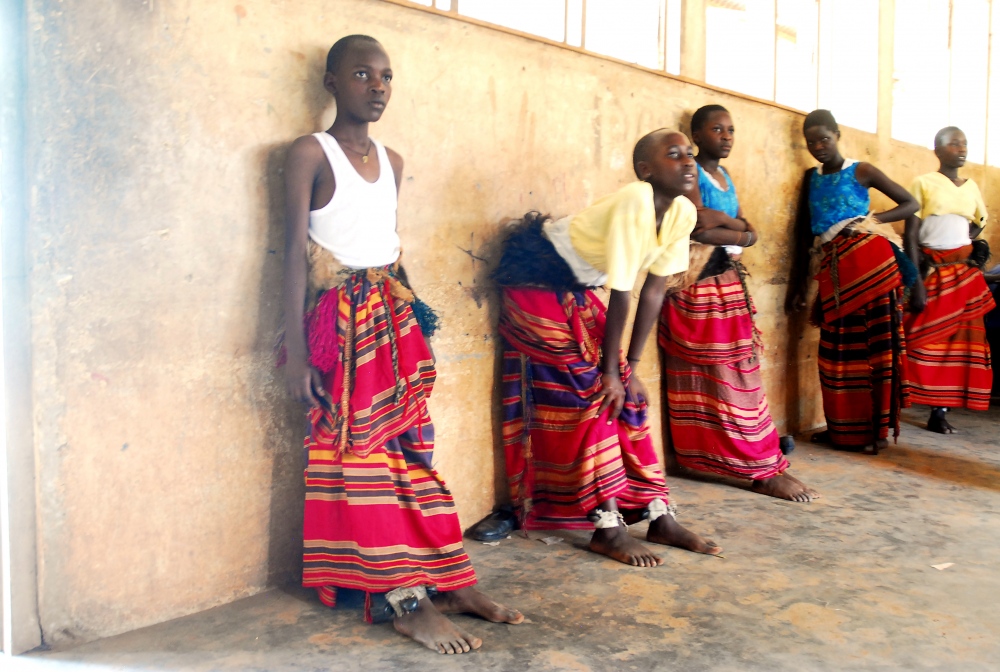  Girls rest during a dance class at Murchison Bay Primary School in Kampala. The class was...