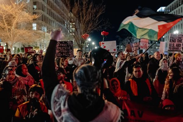 Image from The 2024 State of the Union Address -    Protesters gather outside the White House in...