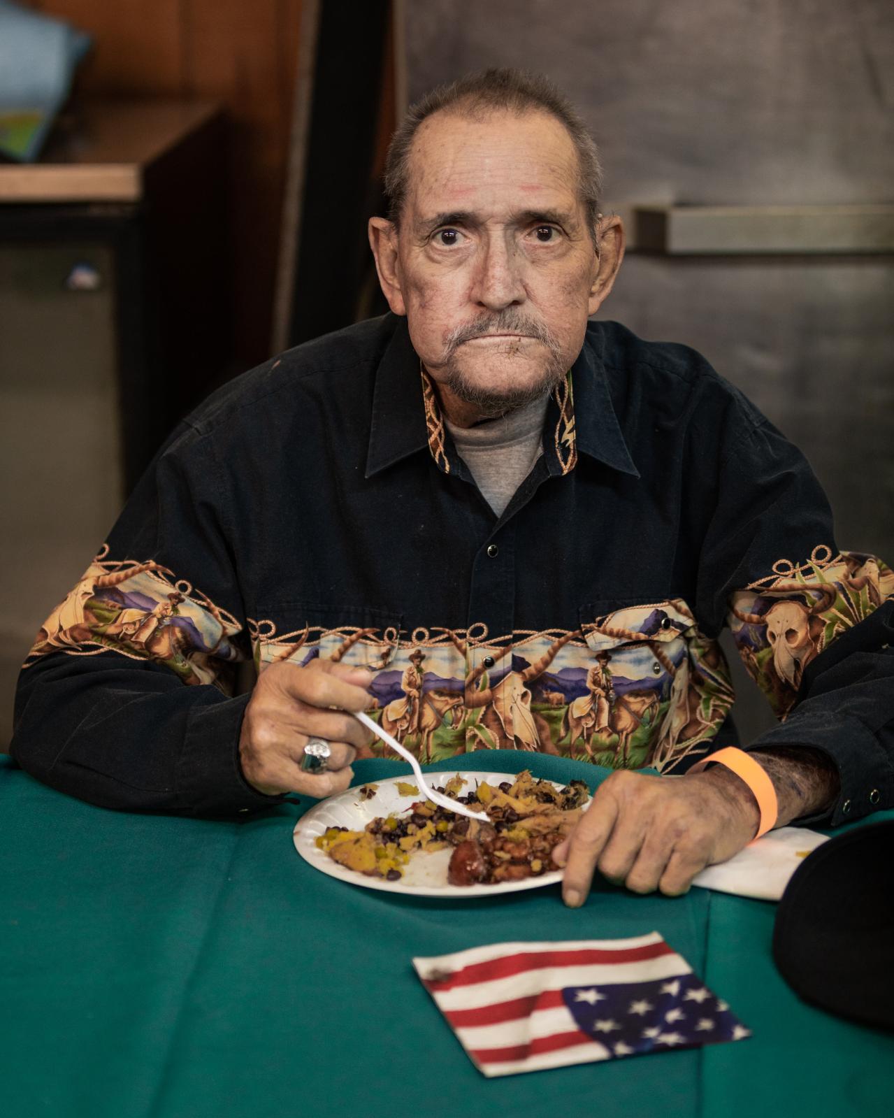 Post 67: American Legion, American Stories - Clyde &#39;Gunny&#39; Allen at the holiday potluck. Gunny became homeless in 2020. His...