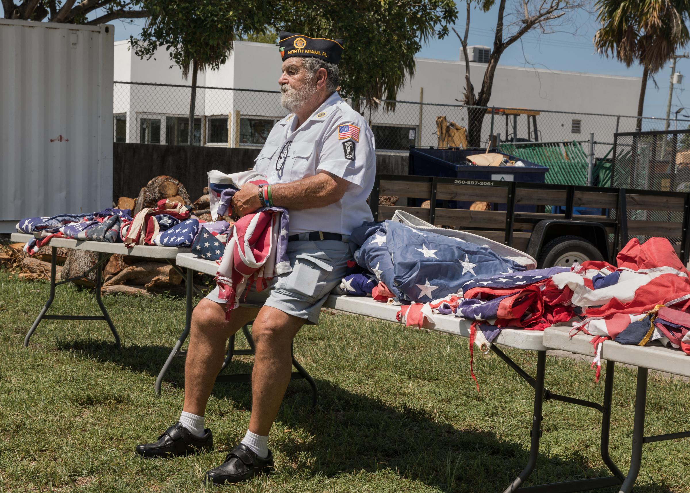 Post 67 - Post Commander Richard Izzy takes a moment to reflect during the flag retirement ceremony.