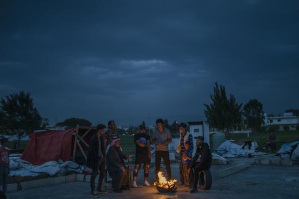  NRC: Syrian stateless in Lebanon - On May 5th, 2023, a group of Syrian refugees from Raqqa, warm themselves with a bonfire in an...