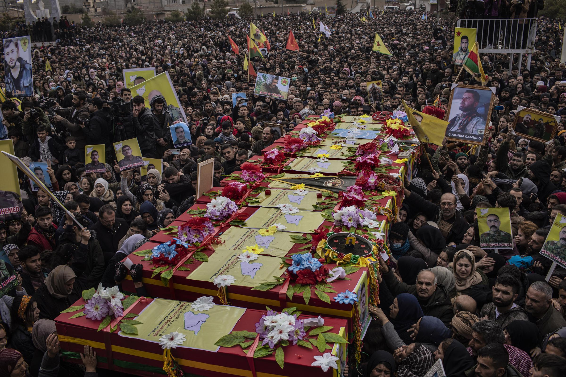 Prison break Syria - February 2, 2022 Qamishli, Syria. Thousands of mourners...