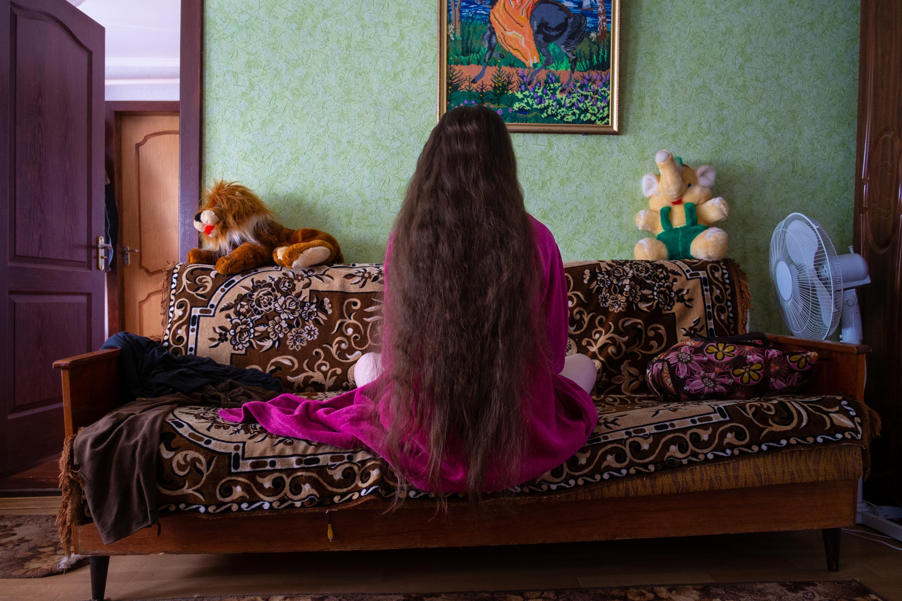 THE RETURN OF VIKA -   Vika's sister in the living room of the family...