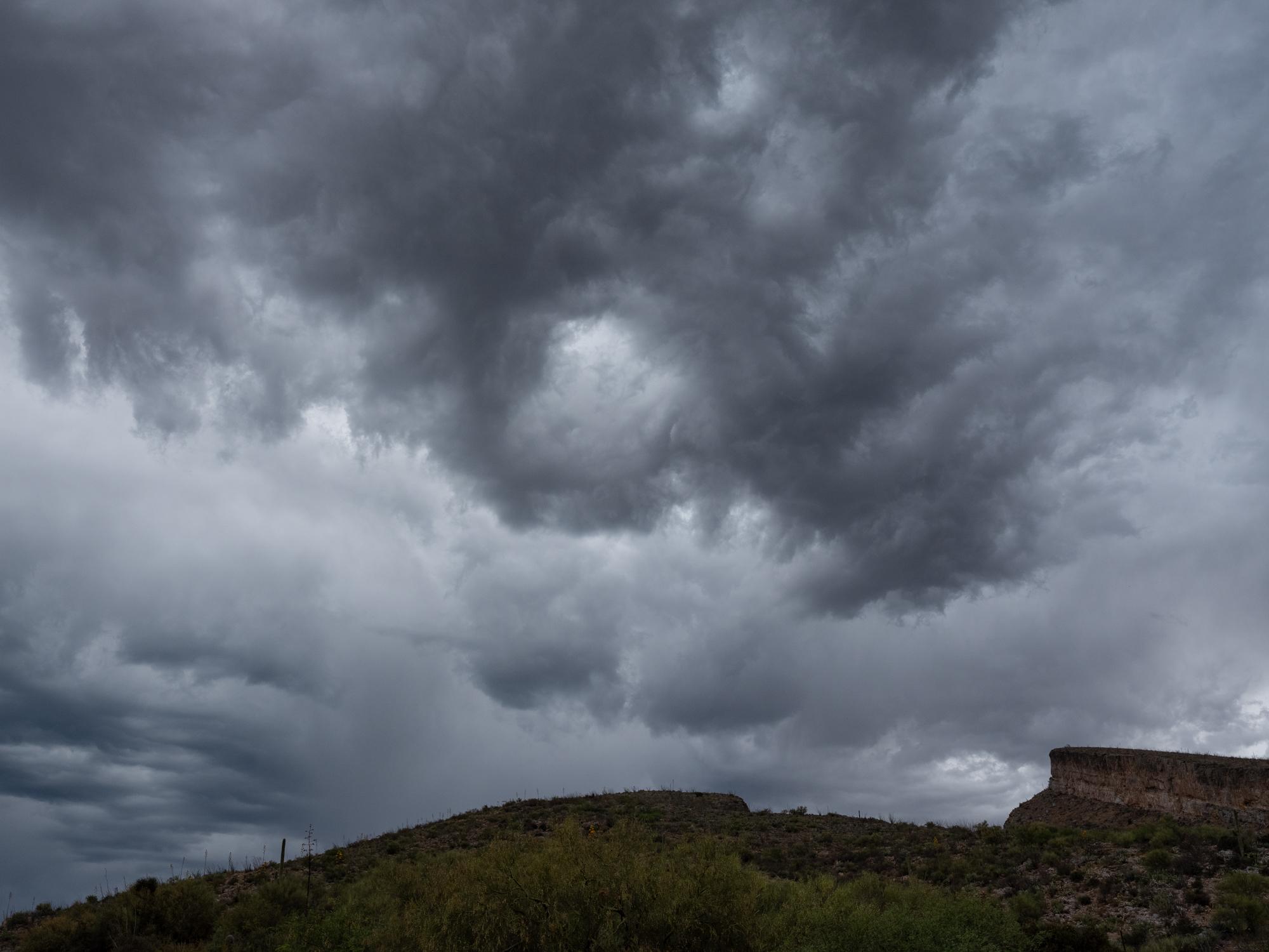 New Arizonans - HuffPost - Monsoon clouds build along Rt. 77 near Mammoth, Arizona.