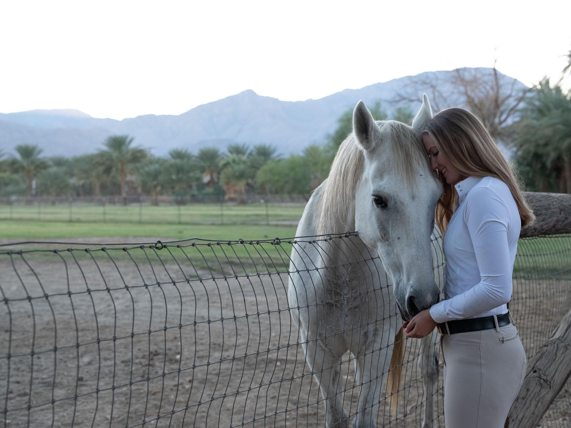 What Happened at the Stables - Bloomberg Businessweek - Maggie Kehring with a horse at Rancho Remuda.