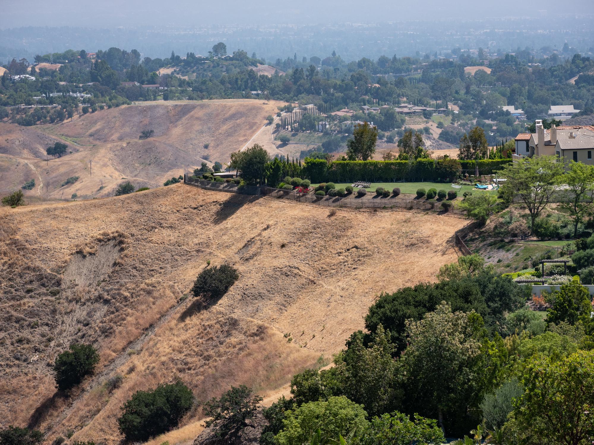 Water Cops - Wall Street Journal - Views of The Oaks gated community and surrounding hills...