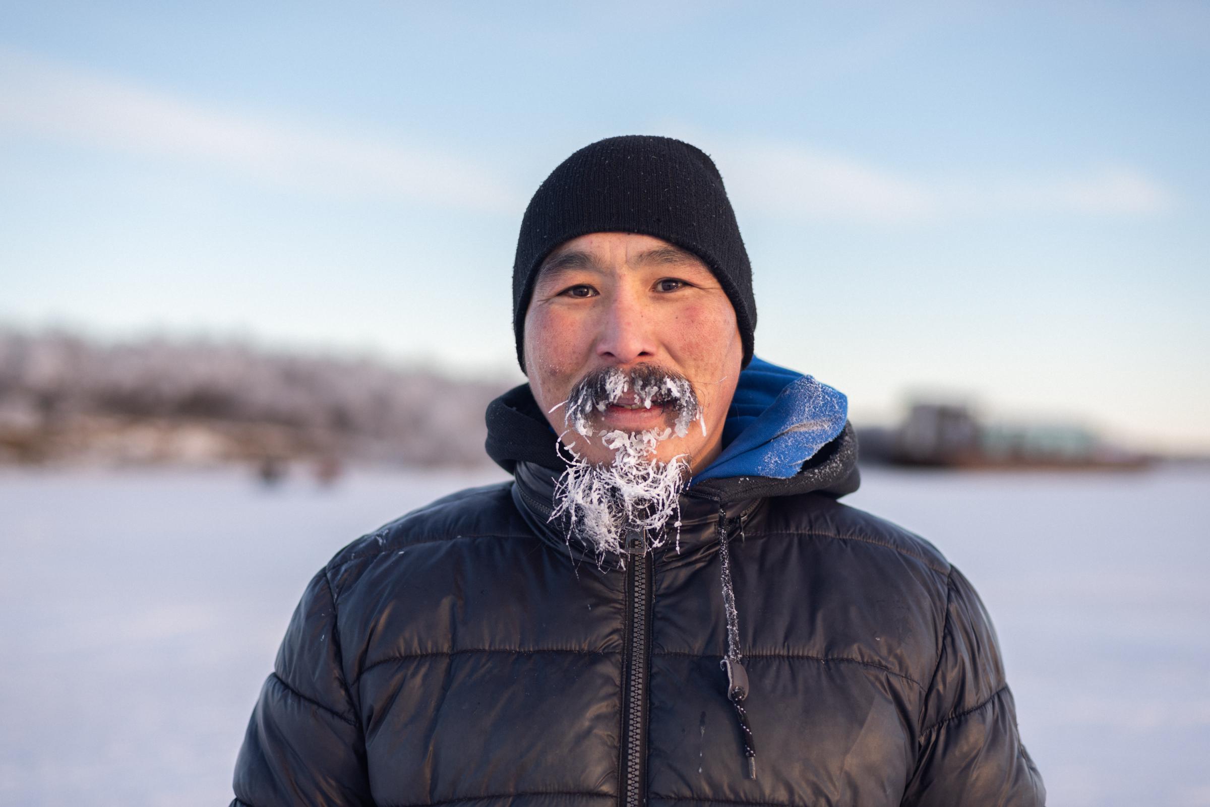 Mushing on the Kuskokwim - High Country News - John Snyder of Akiachak is covered in frost after...