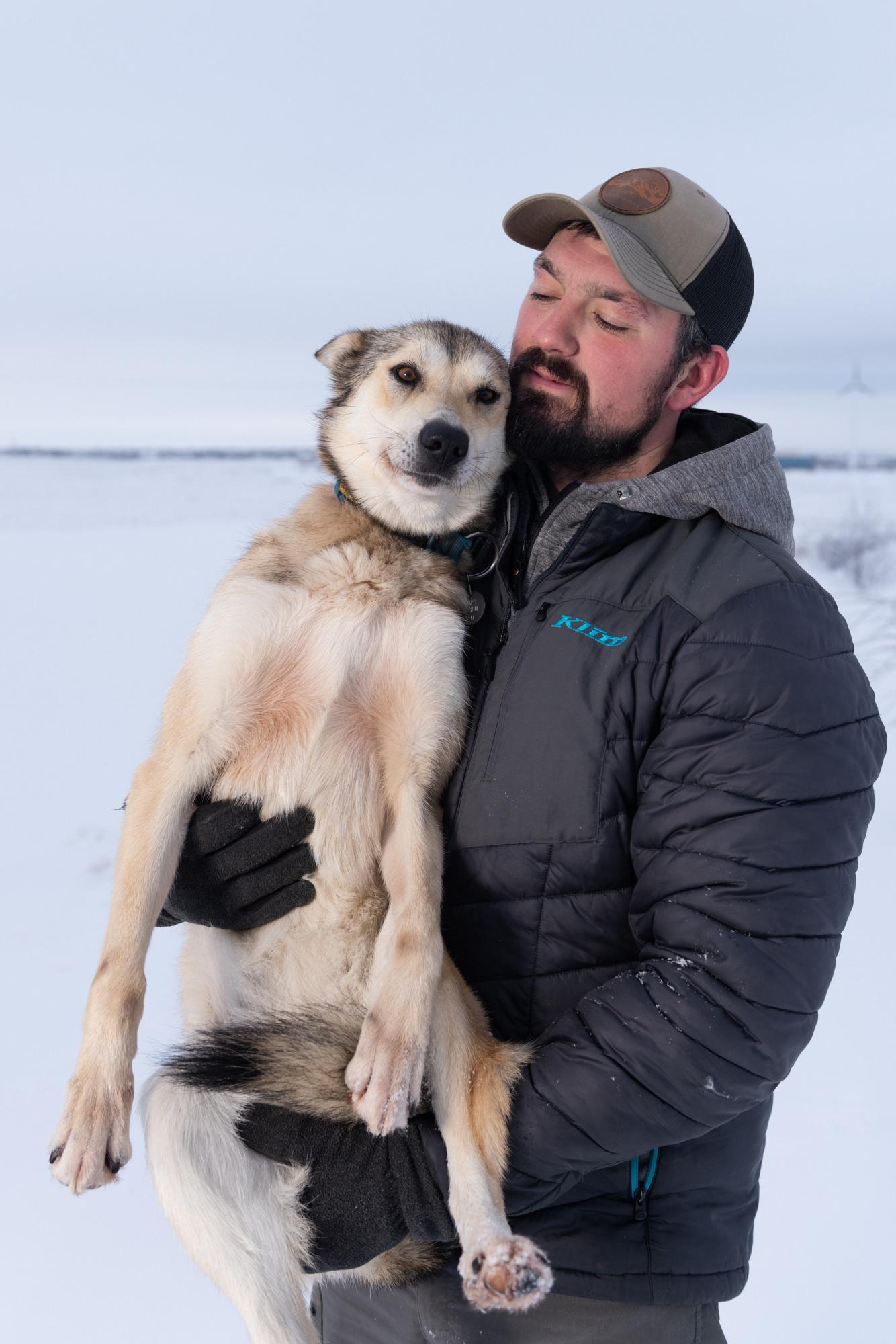 Mushing on the Kuskokwim - High Country News - Musher Pete Kaiser poses for a portrait on Feb. 3, 2023...