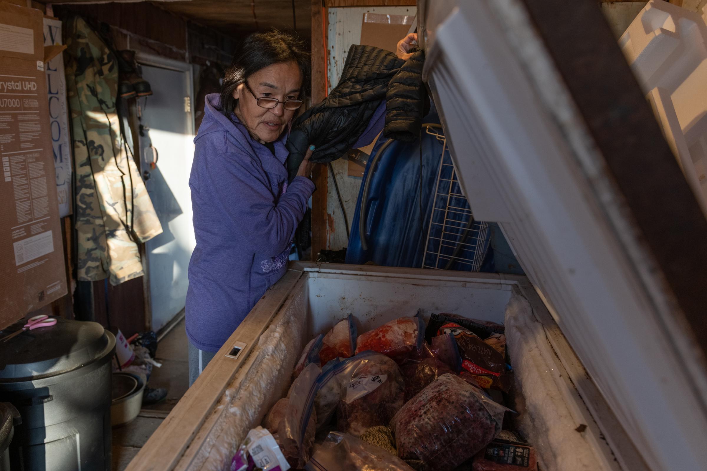 Climate Change Comes for the Freezers - The New York Times - Bernetta Rivers opens her freezer after a recent power...