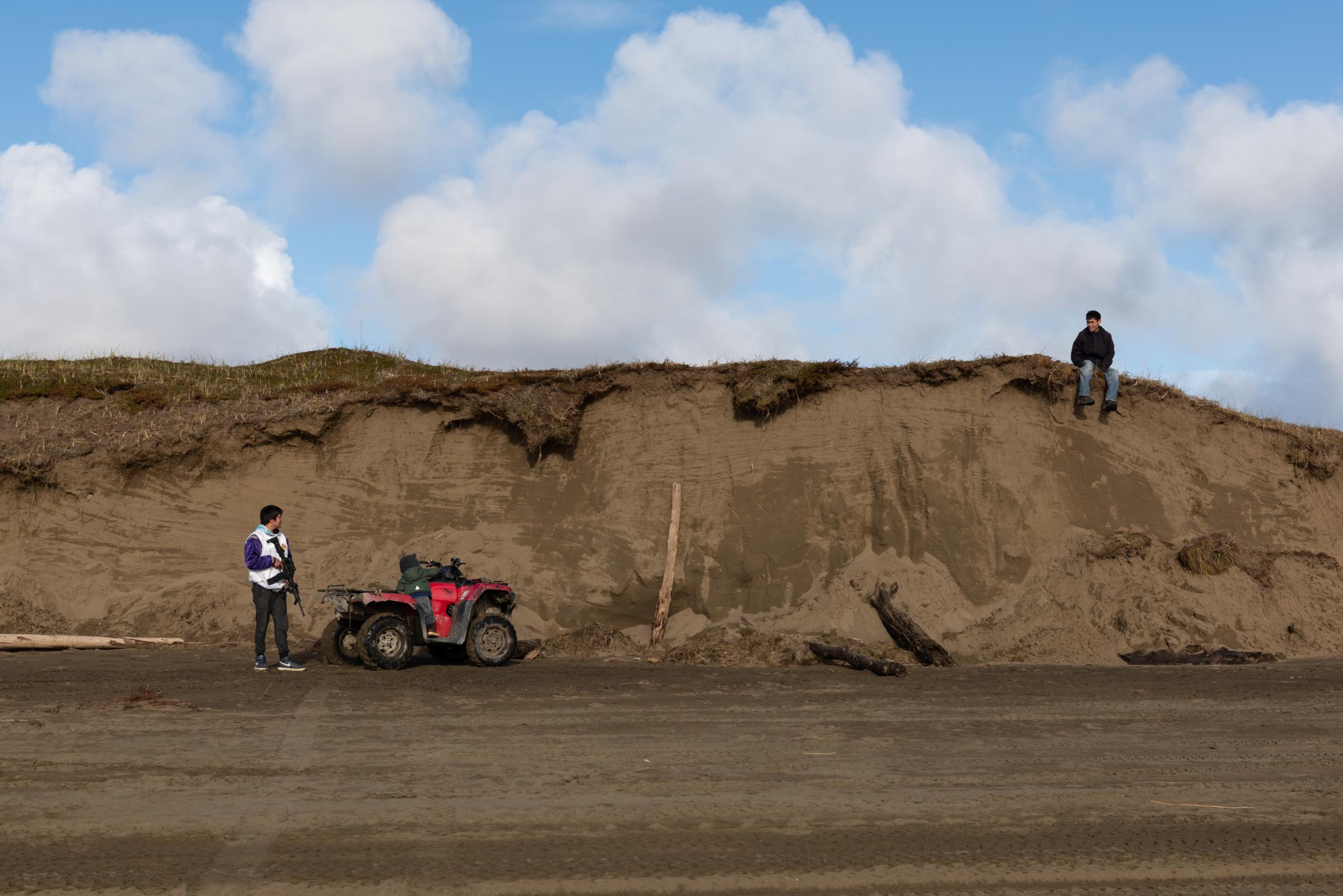 Climate Change Comes for the Freezers - The New York Times - The bluffs in Hooper Bay function as a barrier between...