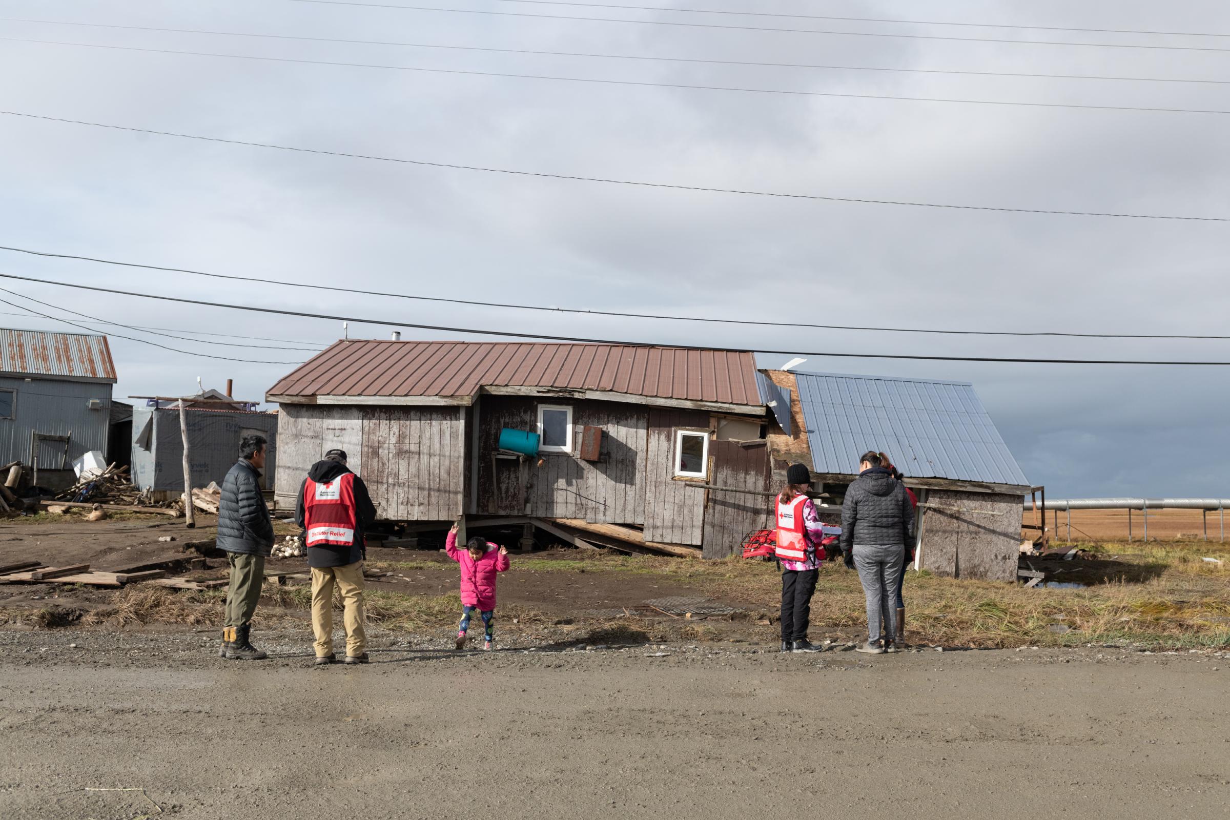 Climate Change Comes for the Freezers - The New York Times - Red Cross representatives assess the home of Elias and...
