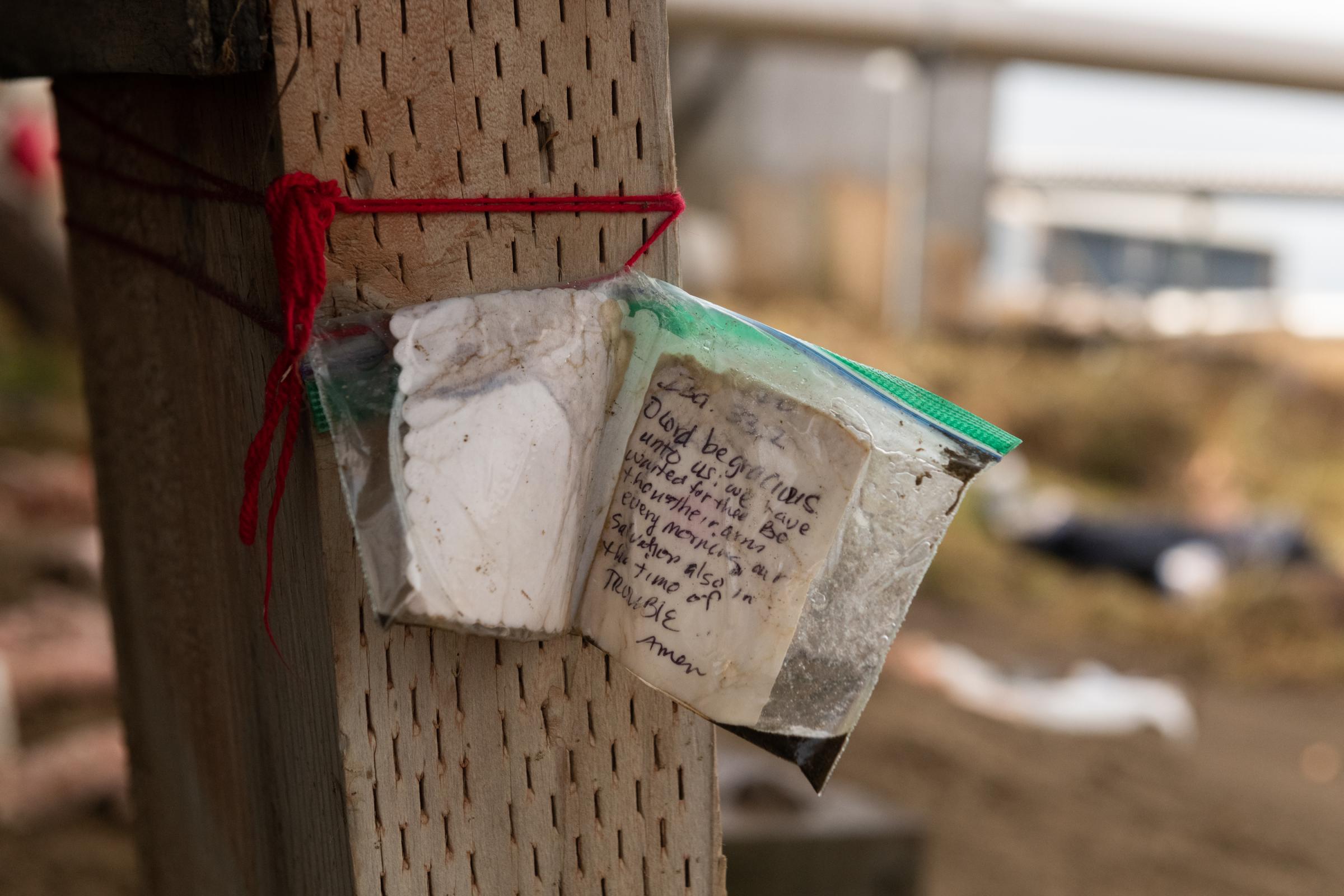 Climate Change Comes for the Freezers - The New York Times - A prayer written by Frieda Stone hangs on a support beam...