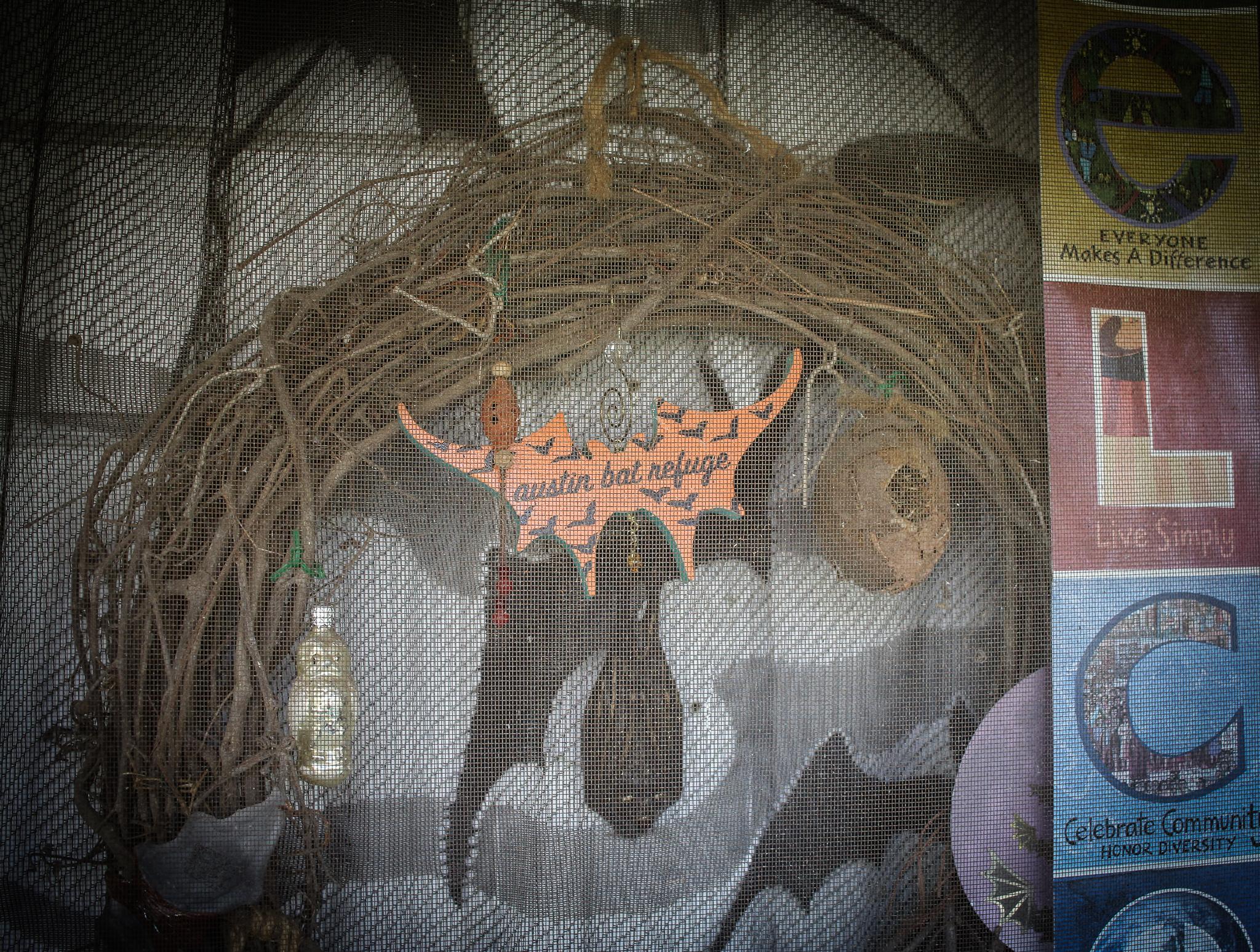 Bat Refuge - A makeshift sign that hangs on the front door welcoming...