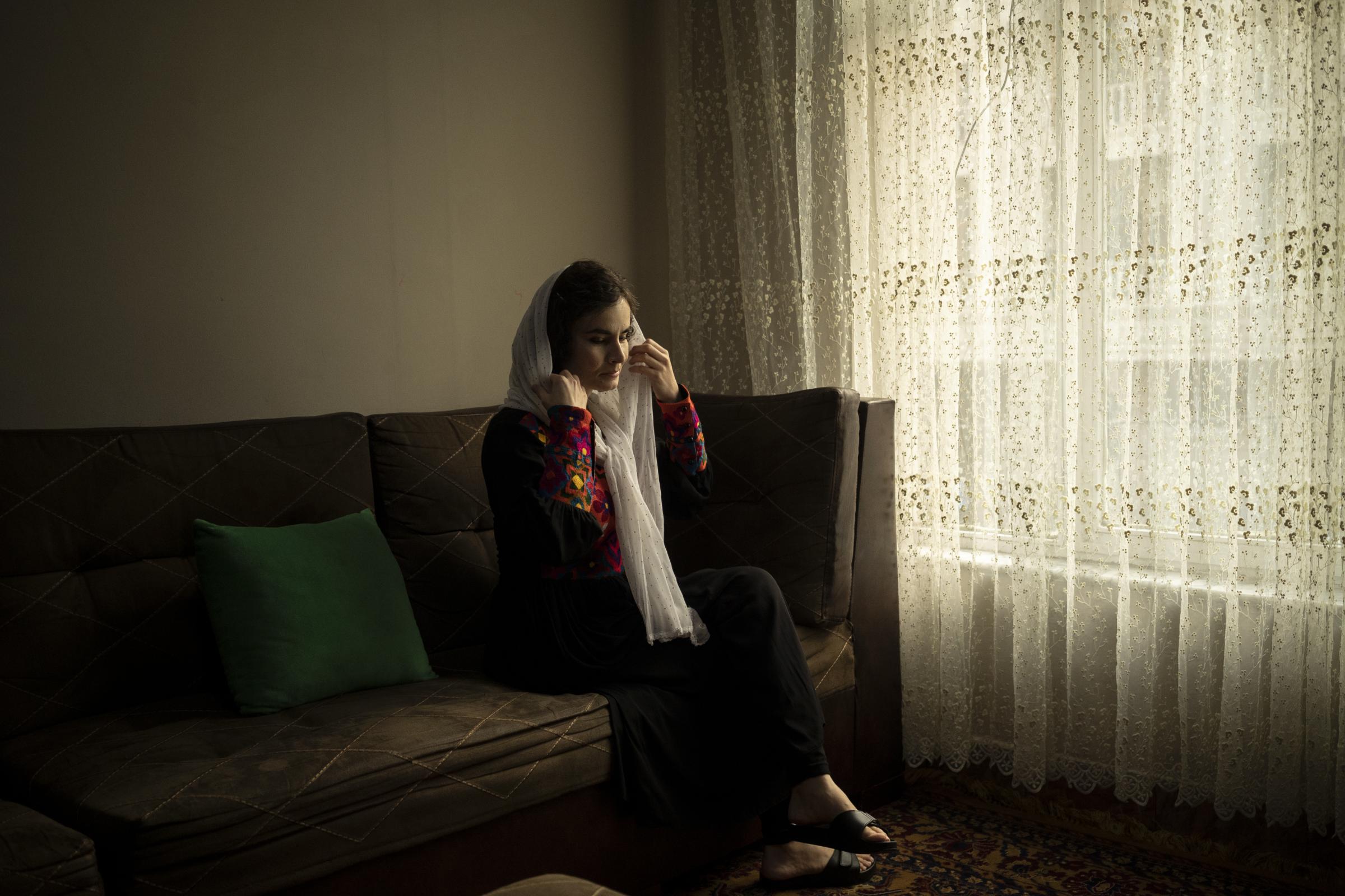 The Cinema of Kabul - Asita Ferdous sits inside her home in Kabul, Afghanistan...