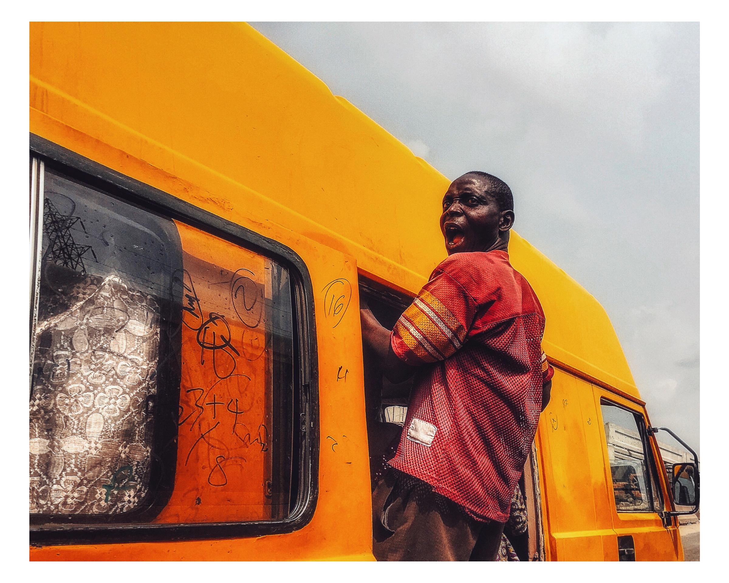 LagosLivesOn: A portrait of a bus conductor in action