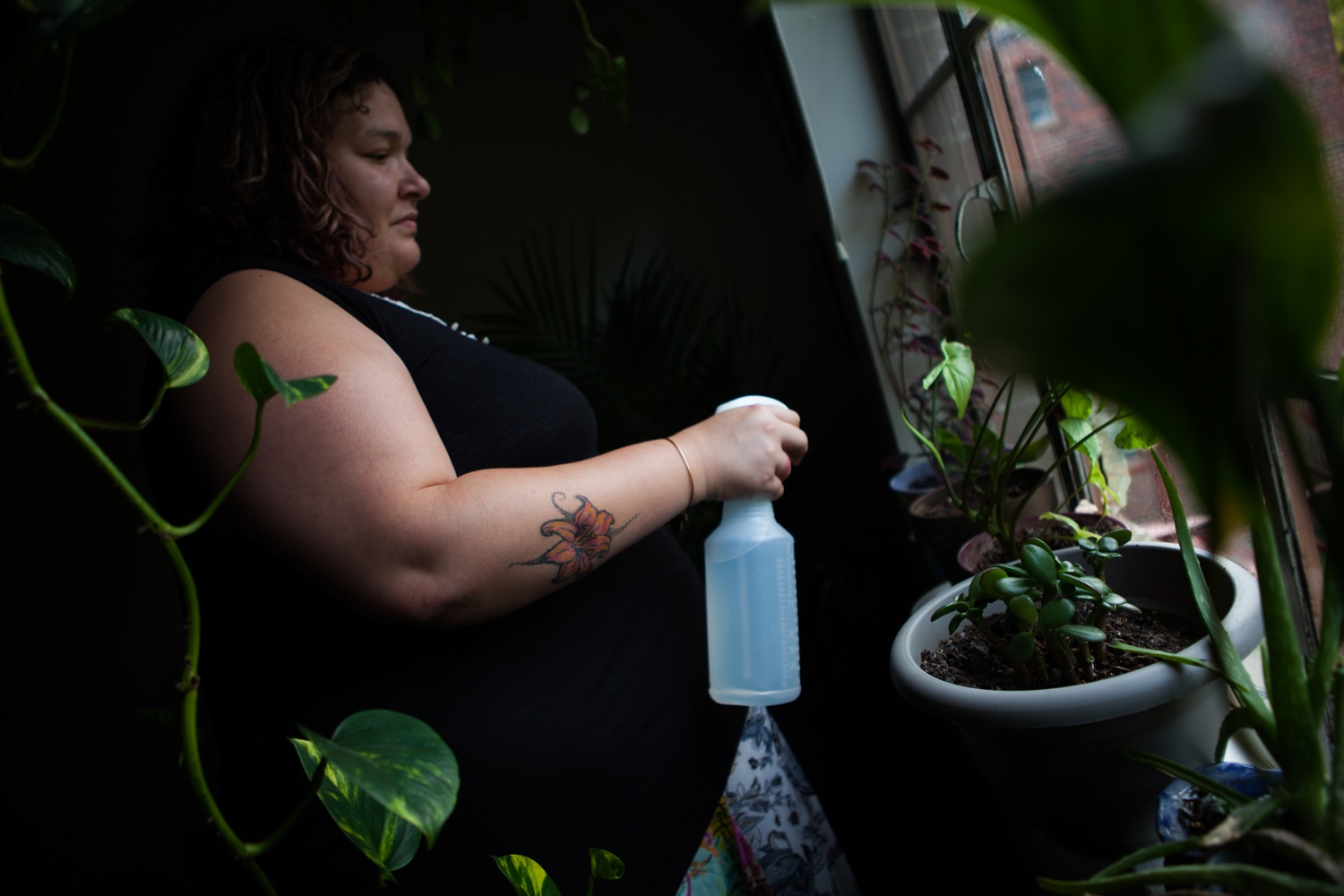 Survivors Ink -    Erica Cortez, 33, a sex trafficking survivor, waters...