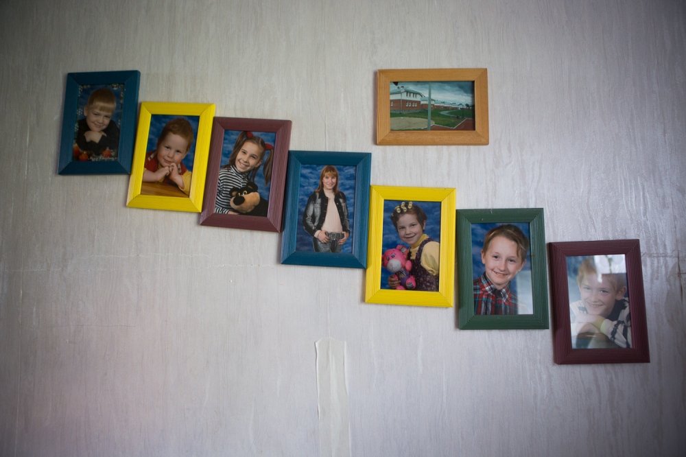  Mama Antonina has photographs of her children who have aged out of the village framed on a wall in her home. Patoka proudly maintains strong...