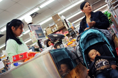  Rosa (name changed to protect anonymity), an undocumented Ecuadorean immigran, buys groceries with her son at a Queens, NY, supermarket. Rosa is in deportation proceedings despite being a domestic violence survivor and having a U.S. citizen son.   