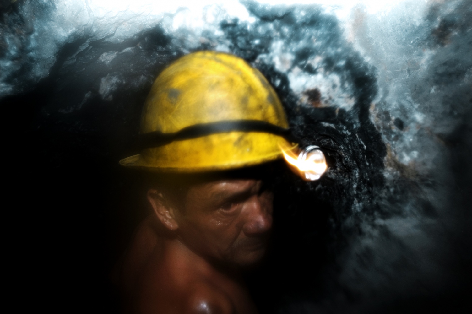 Flesh and Rocks  -  Guaquero(independent emerald mine laborer). inside an...