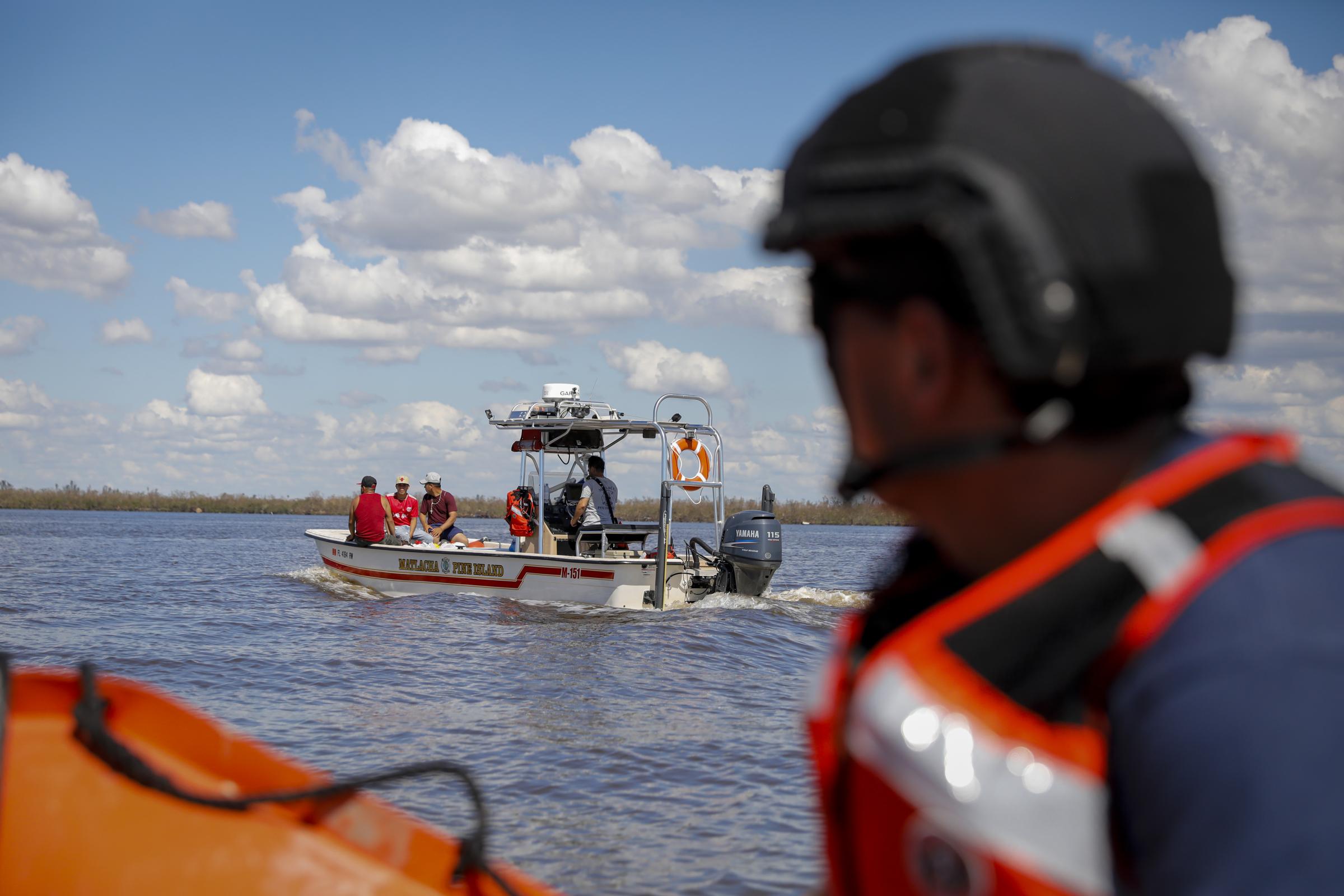 2022 - Hurricane Ian - U.S. Coast Guard rescue team evacuated residents...