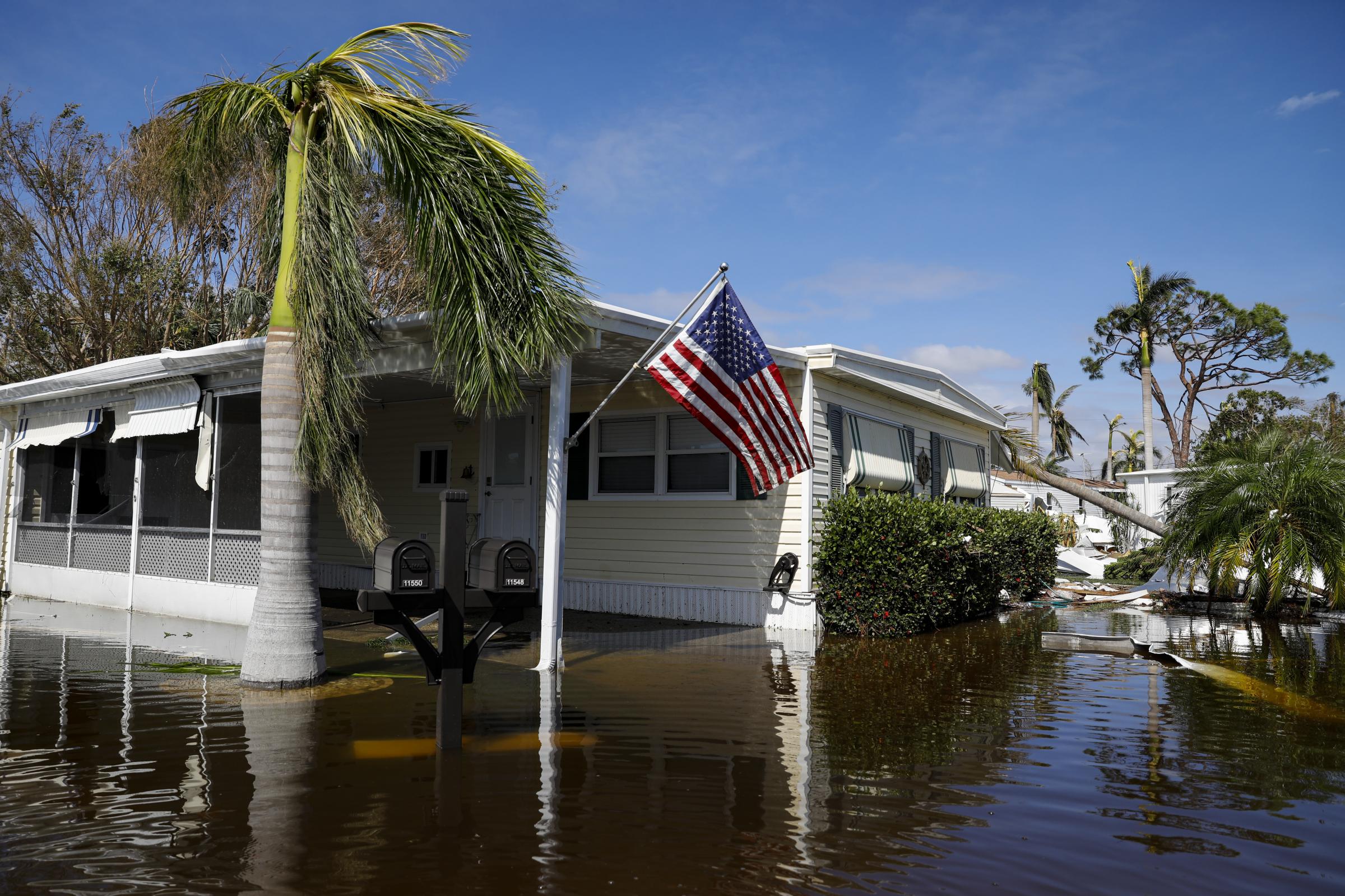 2022 - Hurricane Ian - A flooded house at a trailer park following Hurricane Ian...