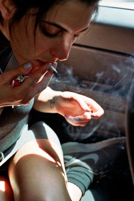 Image from X: A Banner Year -  Jamie smoking in the car, Palisades Park, NJ 