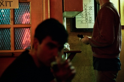 Image from VI: Afterwards -  Peter and Collin playing darts, New York, NY 