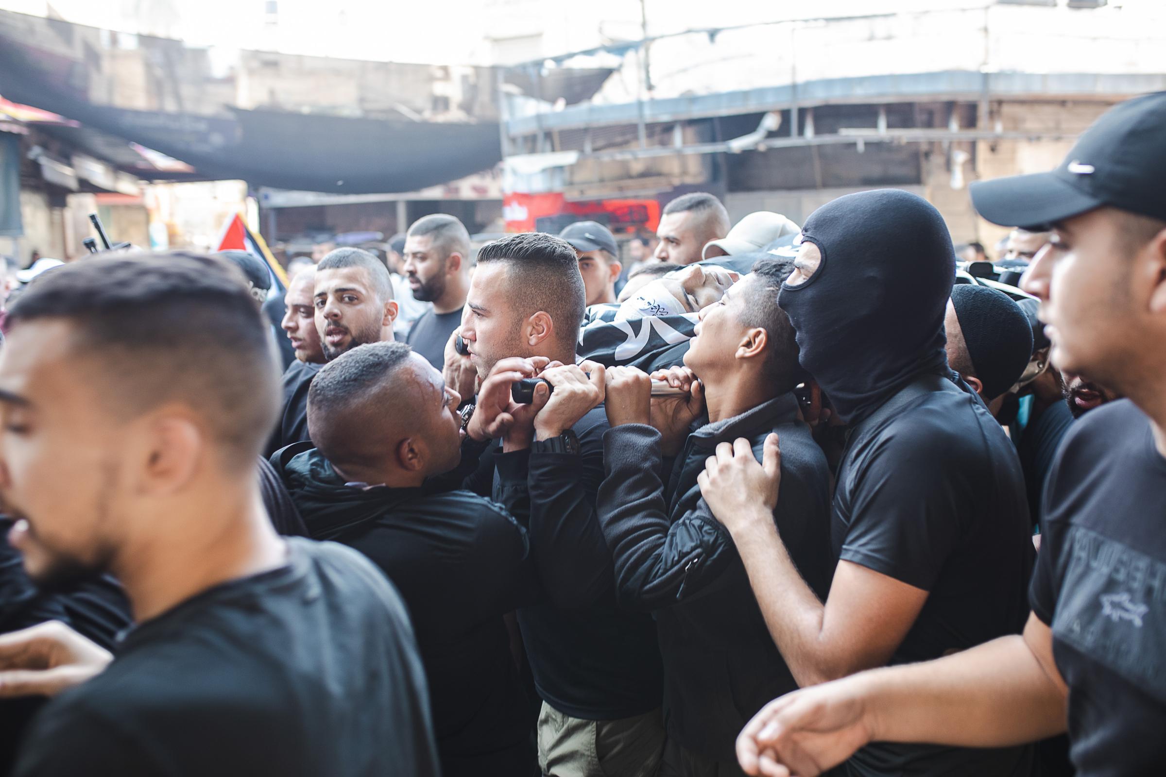 jenin - Jenin, West Bank, November 10, 2023. Hundreds attend funeral of 14 Palestinians killed during...