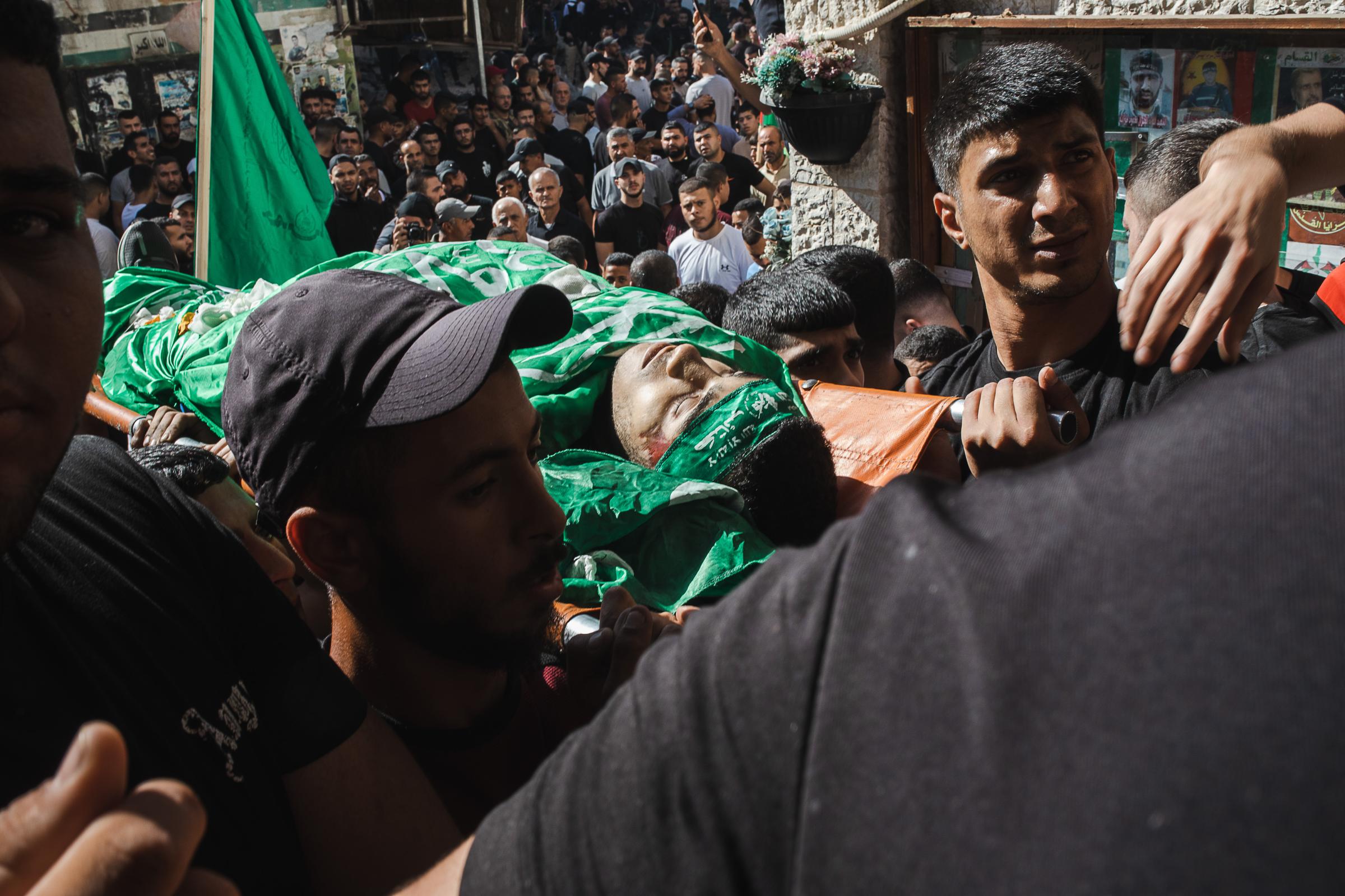 jenin - Jenin, West Bank, November 10, 2023. Hundreds attend funeral of 14 Palestinians killed during...