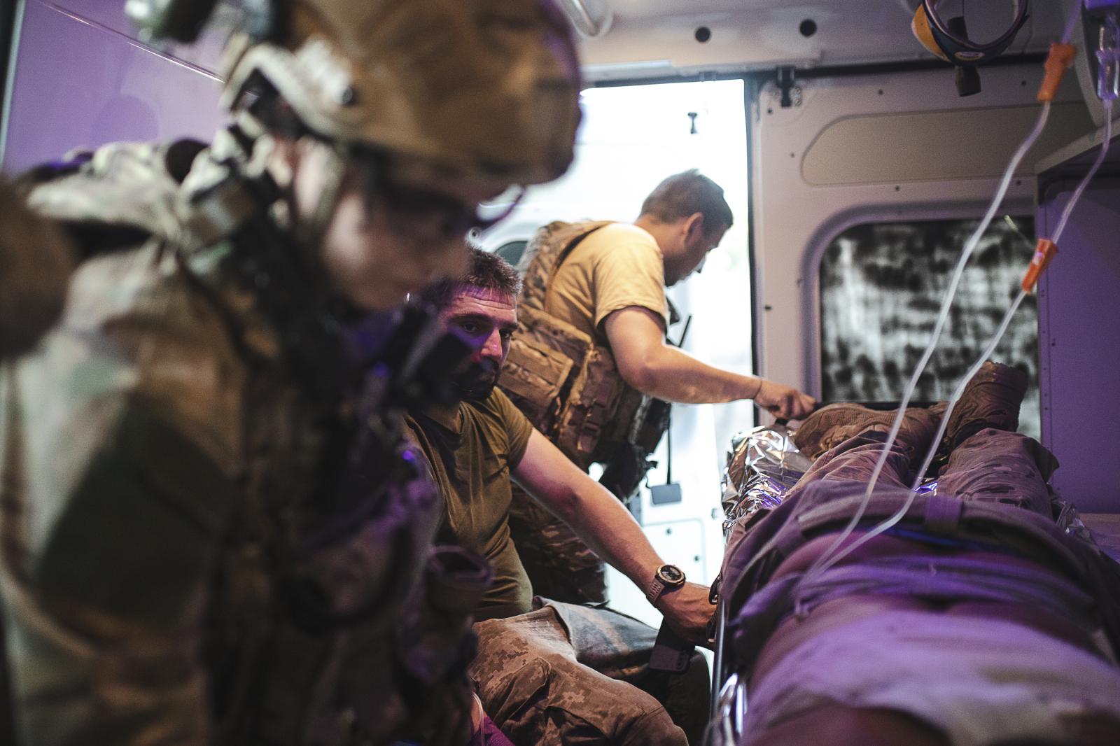 Lifeline - DONBAS, UKRAINE - JULY 11:Combat medics take care of...