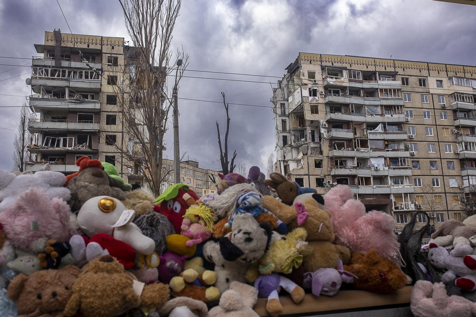 Echoes of destiny: a missile's whisper in Dnipro - DNIPRO, UKRAINE - 21 FEBRUARY: Toys and flowers are laid...
