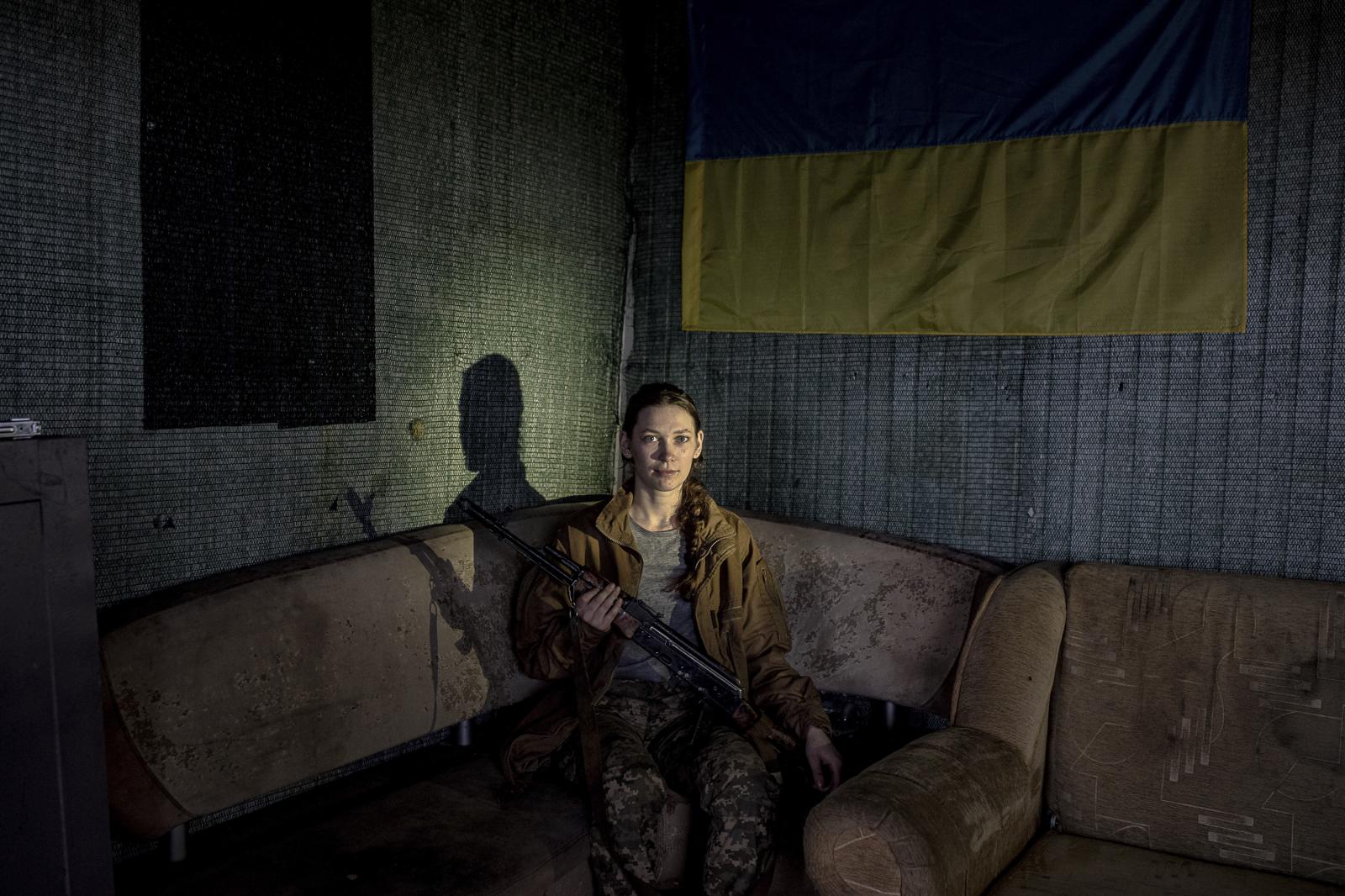 Defenders in training: empowering Ukrainian civilians amidst ongoing war - KYIV REGION, UKRAINE - July 22, 2023: Portrait of a young...