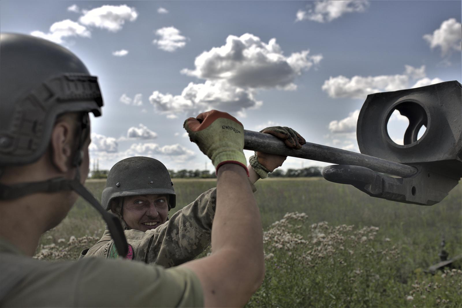 Thunderous guardian: the Ukrainian M777 artillery canon on the frontline - ZAPORIZHZHYA REGION, UKRAINE - JULY 16: Soldiers on duty...