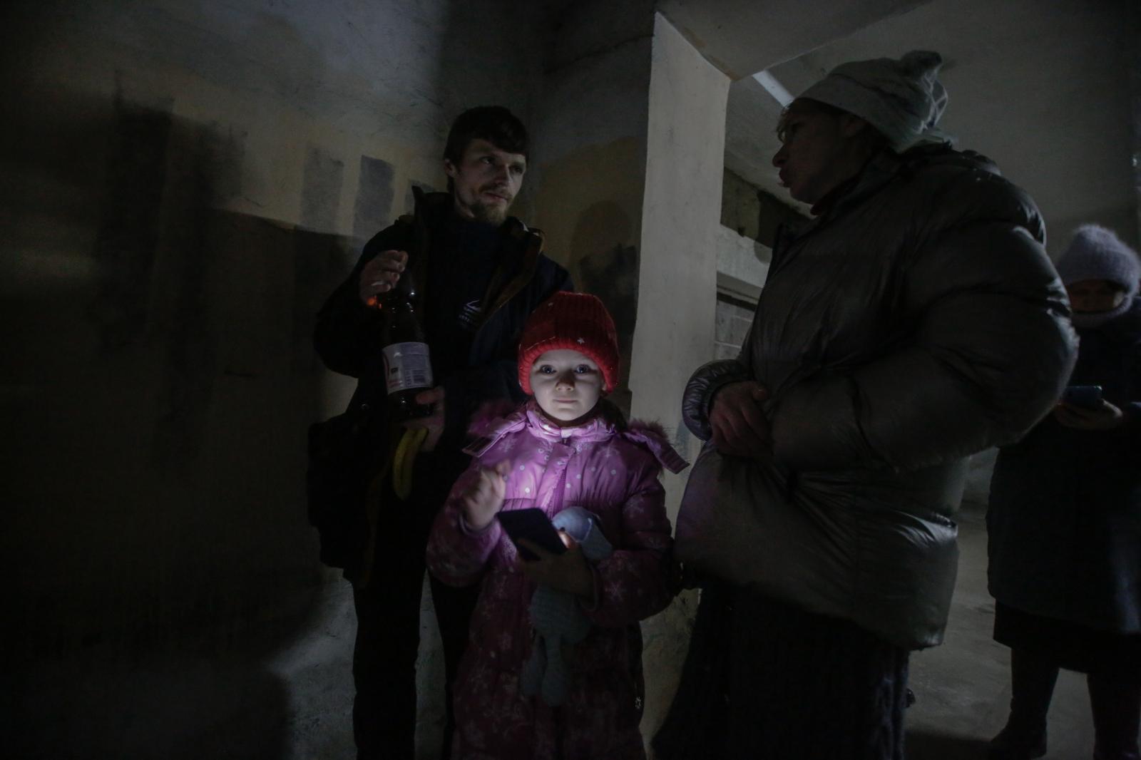 March 11, 2022. Lviv, Ukraine. Pavel, Anna and Kira stay in a shelter while the air raid sirens...