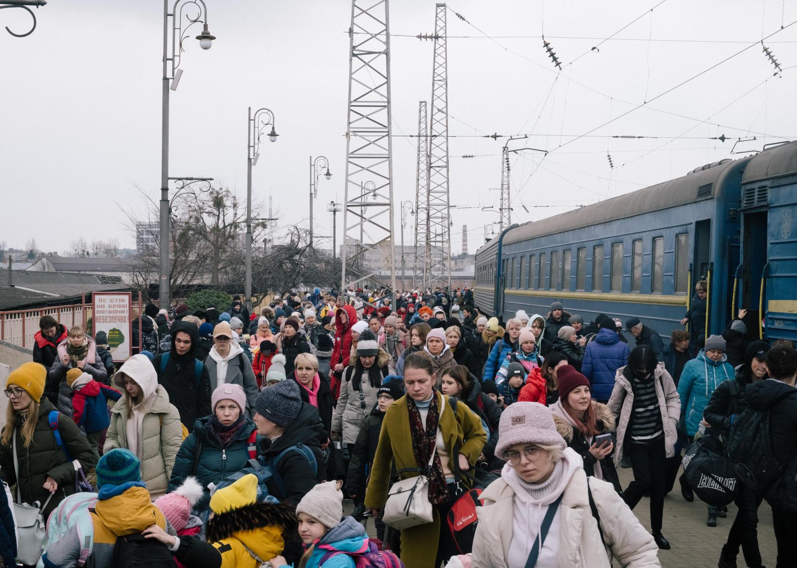 Escaping Putin's Bombs - People arrive on trains from eastern Ukraine at Lviv...
