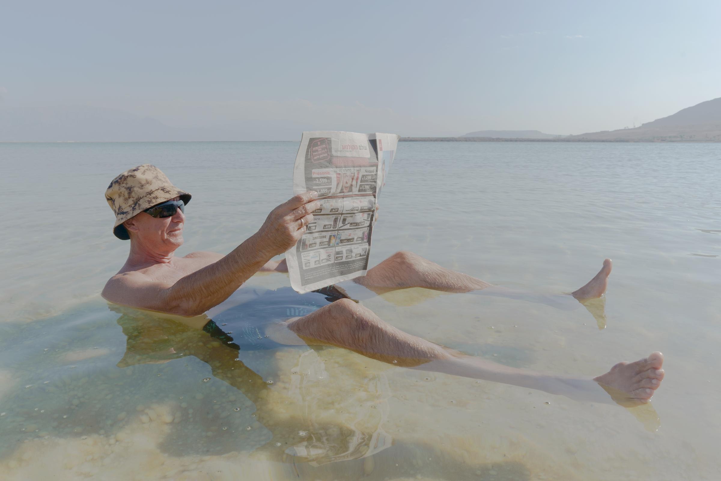 NPR - What is killing the Dead Sea? - Gregory, a recent immigrant from Russia, floats in the...