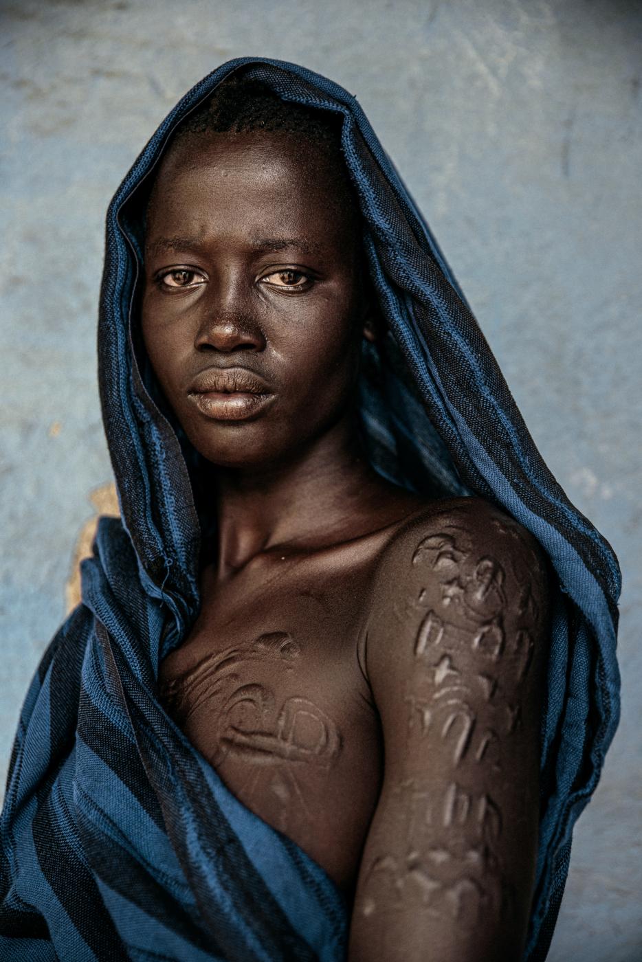 The language of scarifications: A photo essay on the Me'en tribal woman in Ethiopia | Buy this image