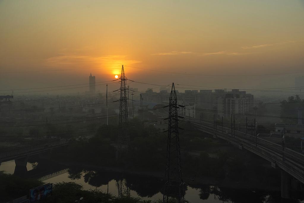 The landscape of Delhi city during sunrise.