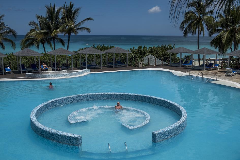 Manifiesto del Agua - Cuba -   Tourists enjoy the pool at their resort in Varadero,...